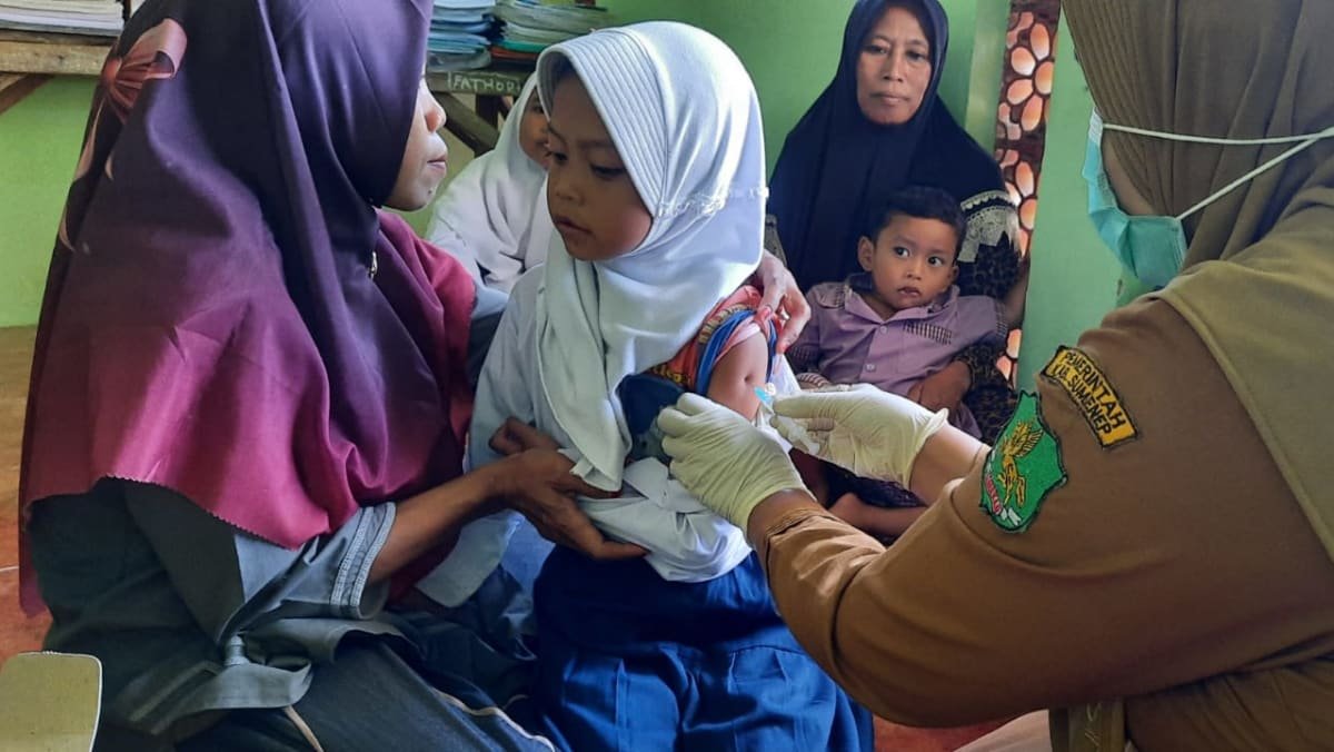 anti vaxxers and vaccine hesitancy contributing to measles outbreaks in indonesia