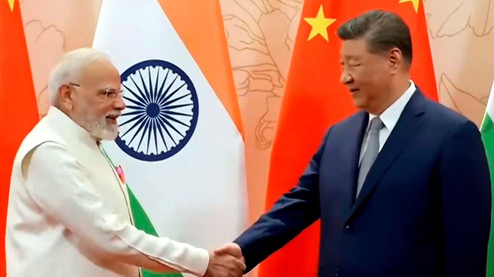 chinese president xi jinping and pm modi discuss friendship and cooperation at sco summit