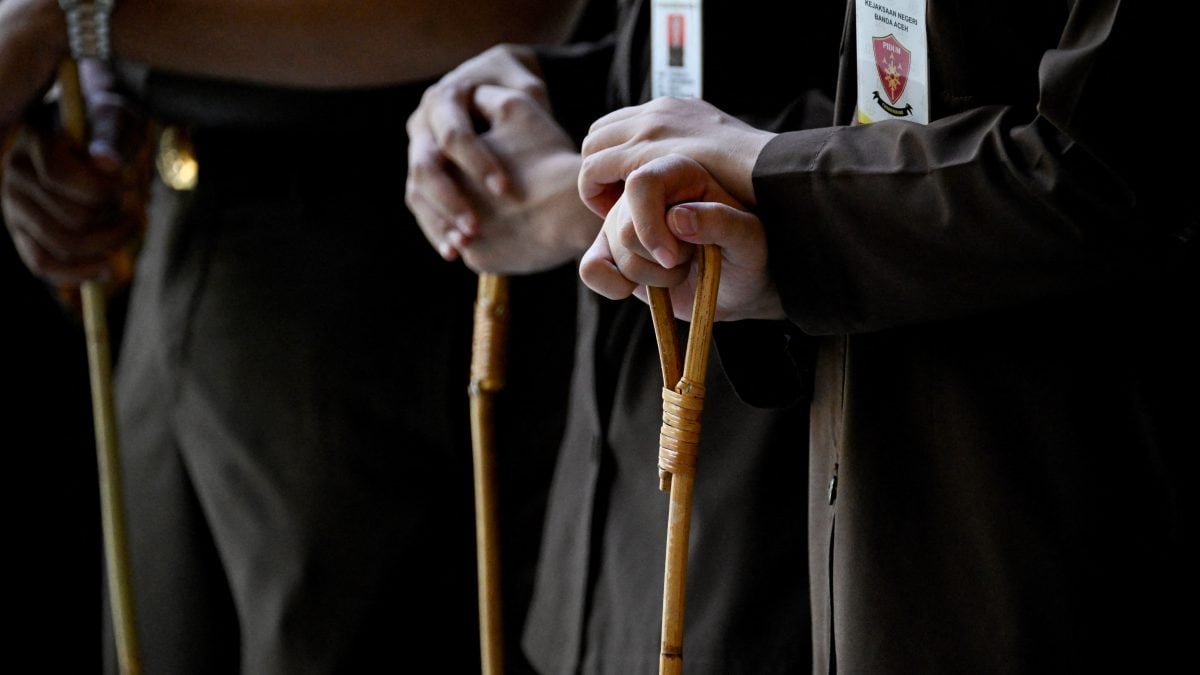 indonesia3a two men flogged 76 times for gay sex in aceh province