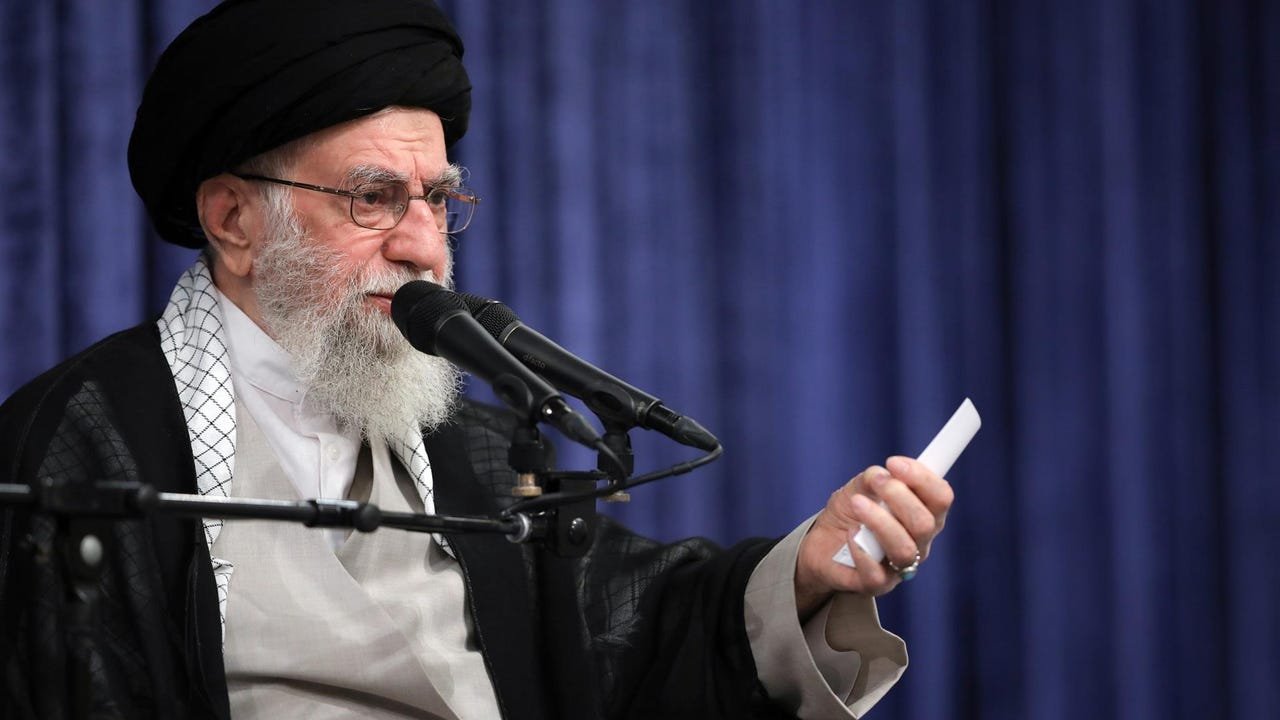 Iran warns it could interrupt cooperation with the International Atomic Energy Agency if sanctions are activated