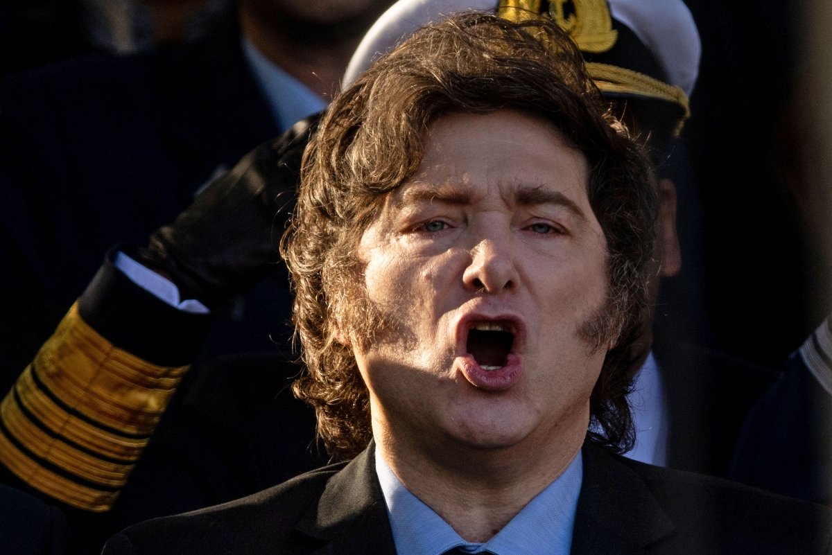 milei removed from car parade after being attacked with stones and bottles