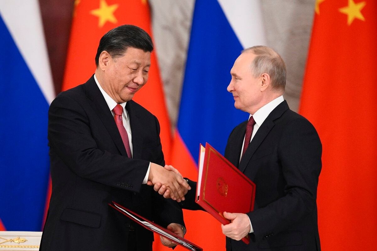 putin criticizes discriminatory trade sanctions ahead of visit to china3b sees common interest with xi jinping