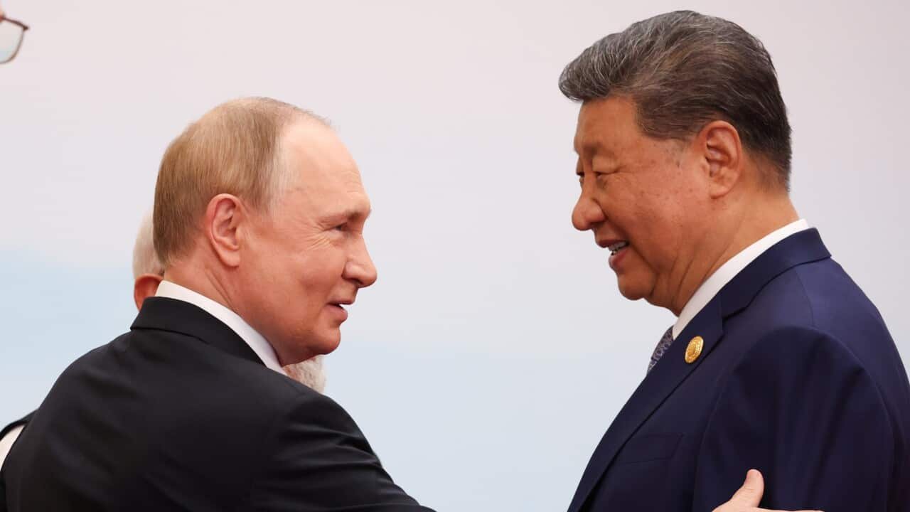 A new crossroads: Xi and Putin criticize West at China security summit