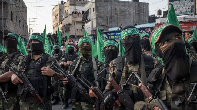 Hamas Movement Releases Farewell Photos of Israeli Hostages