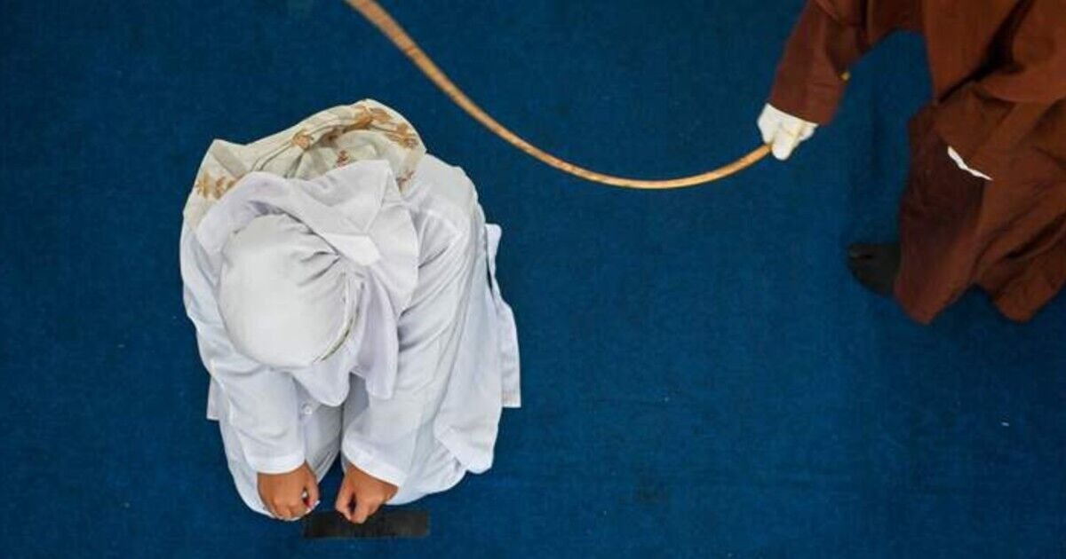 indonesia3a muslim woman whipped for breaking sharia law