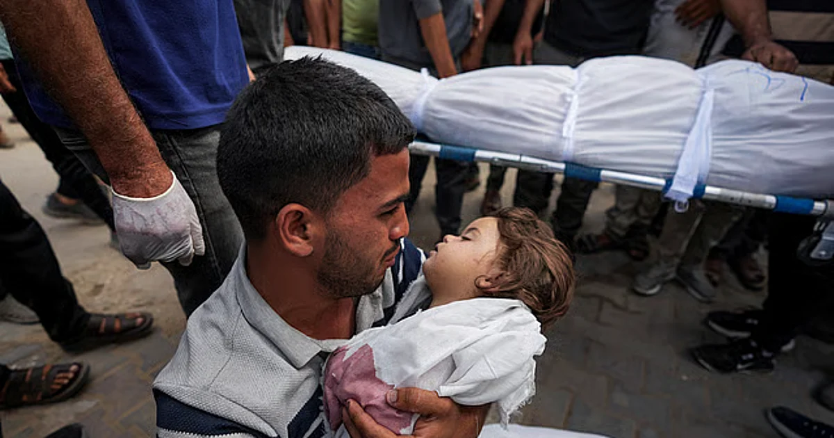 israels attack on gaza refugee camp3a 80 people2c including children killed