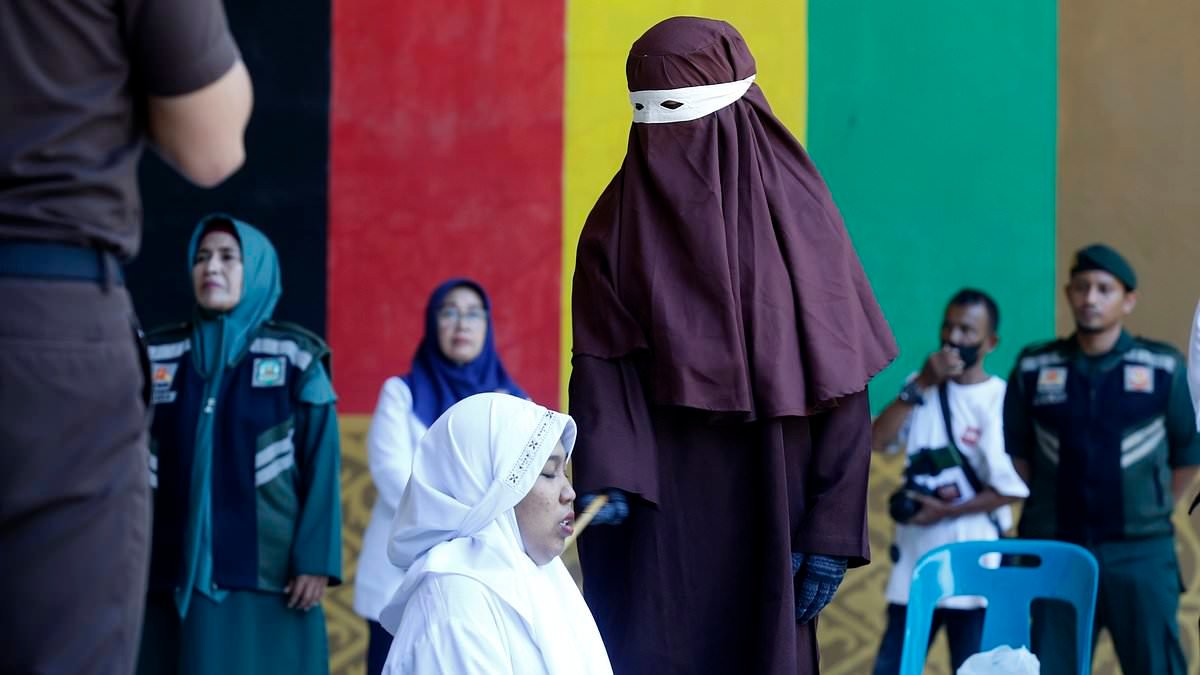 woman whipped with cane for adultery in indonesias aceh province