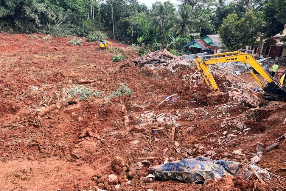 At least 11 dead and 12 missing after landslide in Indonesia