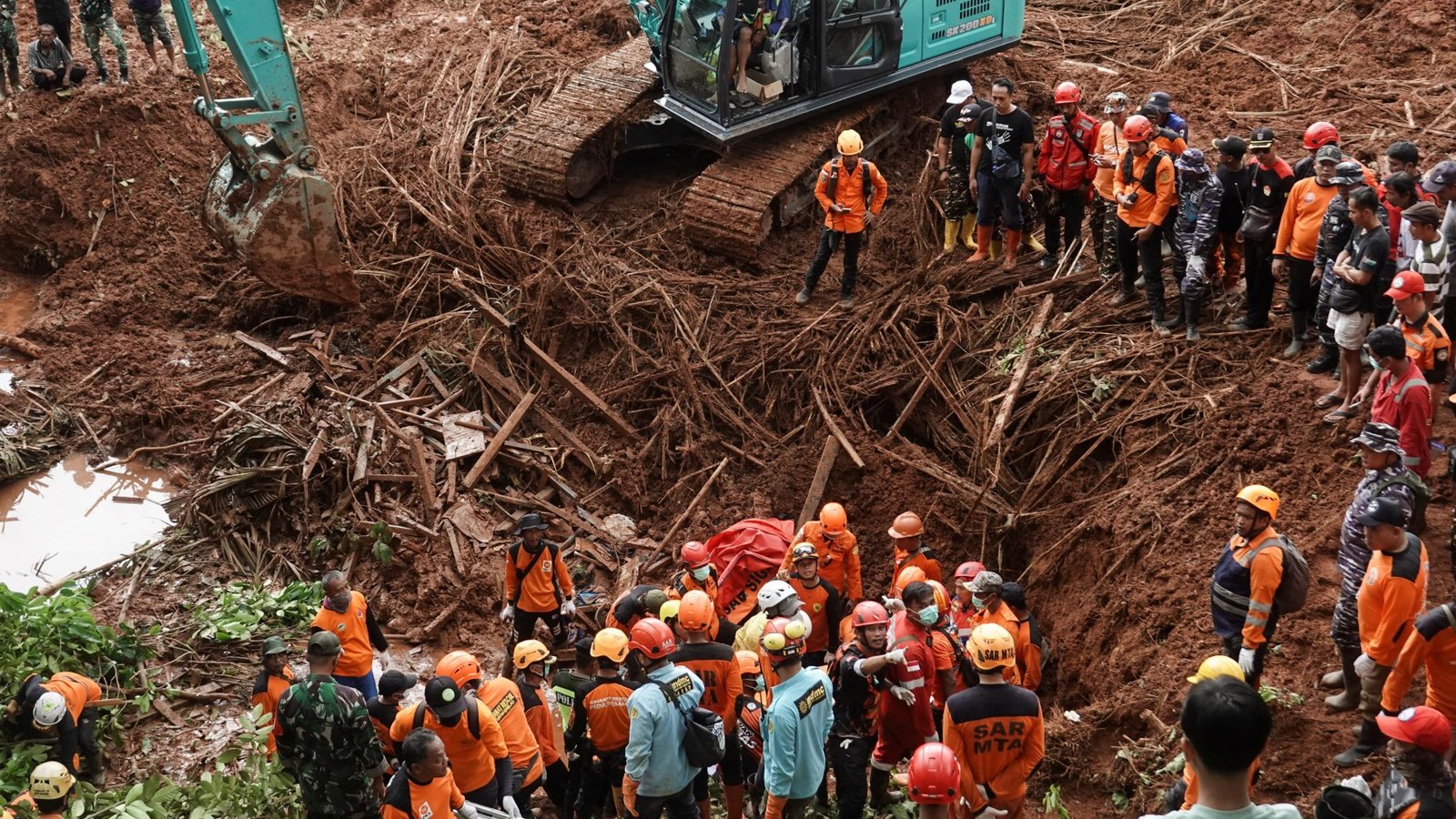 Search Intensifies as Landslide Kills 18 in Indonesia