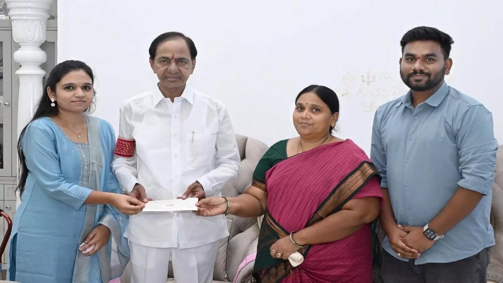 Former CM KCR’s Generous Gesture: Rs 24 Lakhs Cheque for Police Constable’s Family